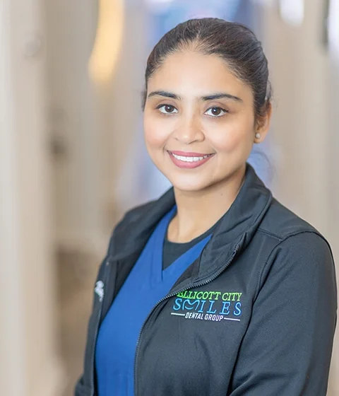 Dr. Navpreet Kaur Khatra, DDS, MS, board-certified prosthodontist at Ellicott City Smiles.